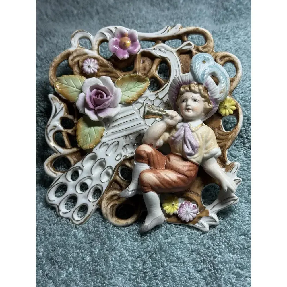 Vintage Porcelain Wall Plaque With Cherub And Floral Design
